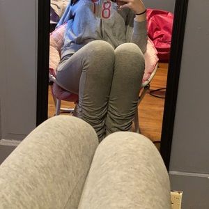 Stacked grey leggings